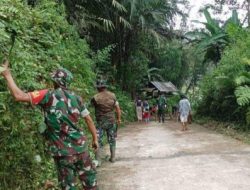 Ciptakan Lingkungan Yang Sehat, Personil Koramil 05/Sanggalangi Melaksanakan Pembersihan Jalan Desa Bersama Dengan Warga