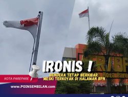Ironis! Bendera Tetap Berkibar Meski Terkoyak di Halaman BPN